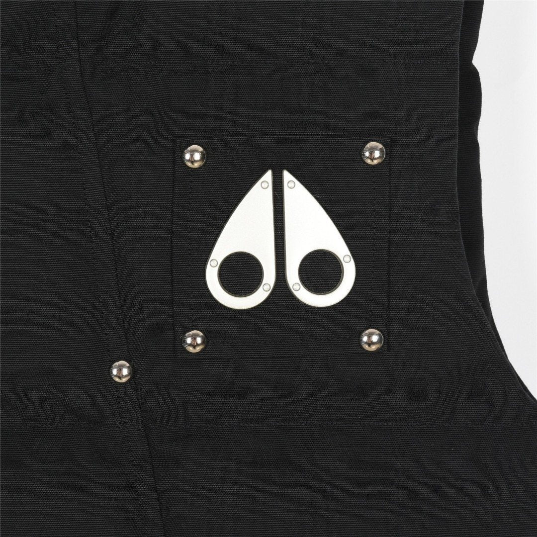 Moose Knuckles Down Vest — Metal Handcuff Badge, Silver Studs, Dual Pockets (Black / White)